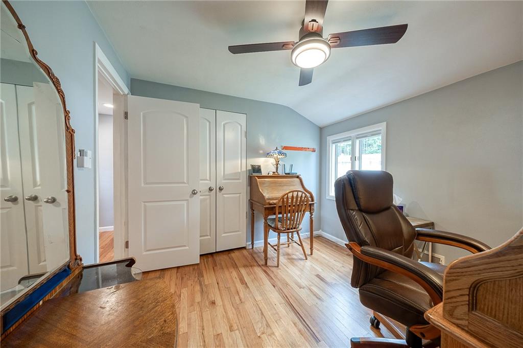 1004 Fiddleback Drive McKees Rocks, PA 15136 - Photo 27 of 41 a workspace with wooden floor chandelier entryway and windows