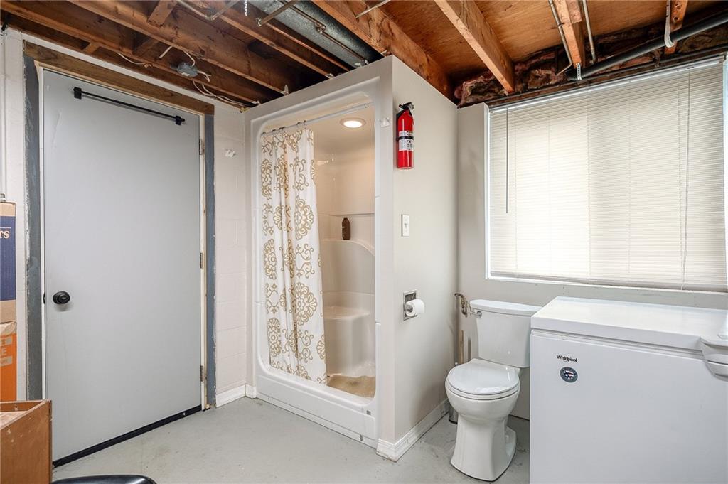 1004 Fiddleback Drive McKees Rocks, PA 15136 - Photo 29 of 41 a bathroom with a toilet and a shower