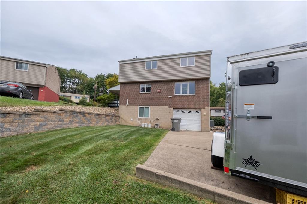 1004 Fiddleback Drive McKees Rocks, PA 15136 - Photo 31 of 41 a front view of a house with a yard
