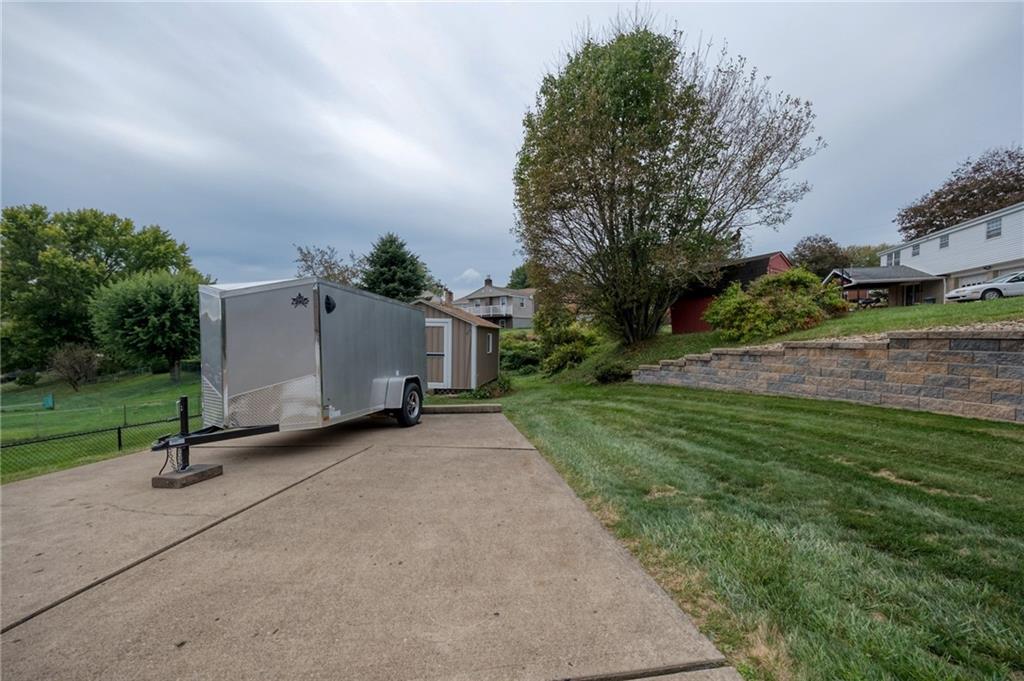 1004 Fiddleback Drive McKees Rocks, PA 15136 - Photo 37 of 41 a view of a outdoor space with deck and yard