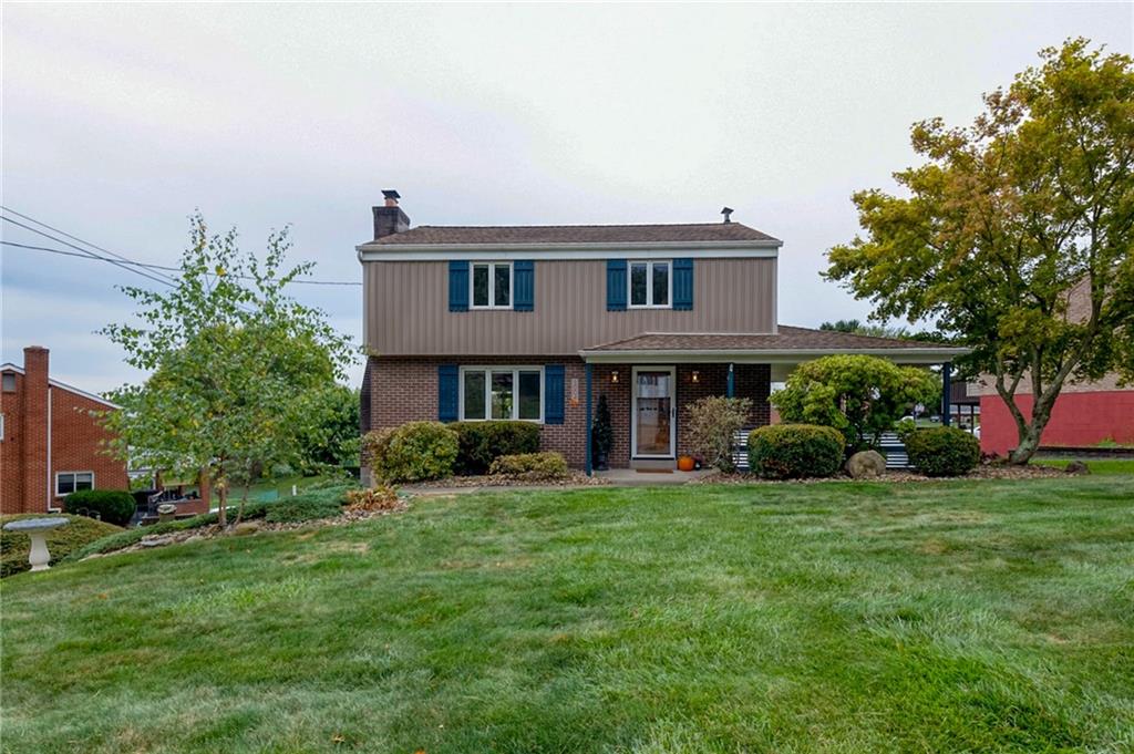 1004 Fiddleback Drive McKees Rocks, PA 15136 - Photo 41 of 41 a view of a house with a yard and sitting area