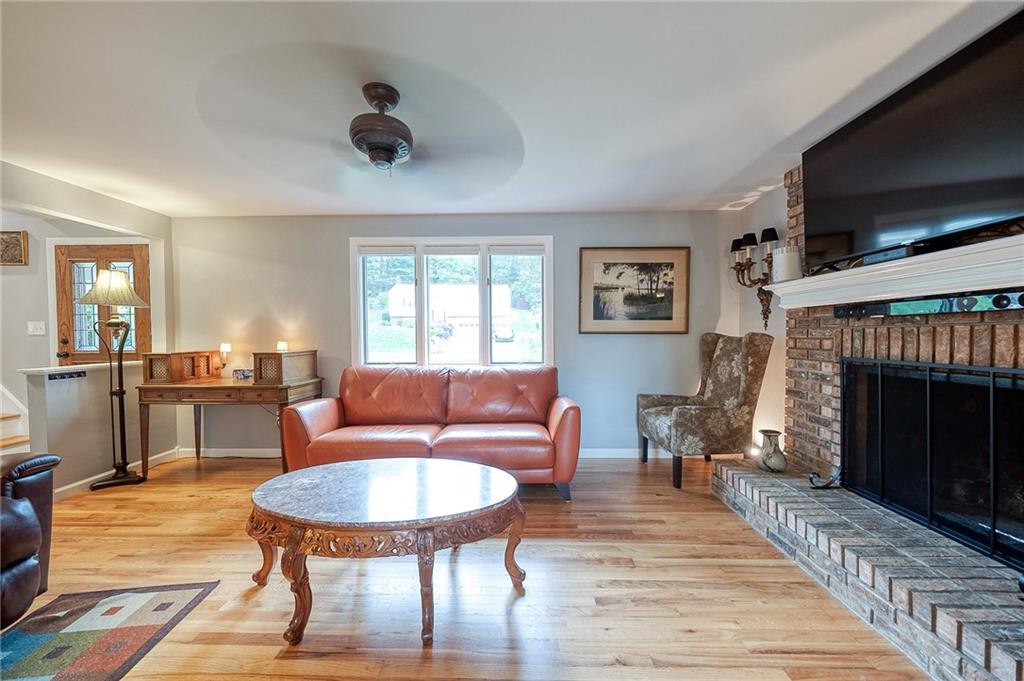 1004 Fiddleback Drive McKees Rocks, PA 15136 - Photo 5 of 41 a living room with furniture and a fireplace