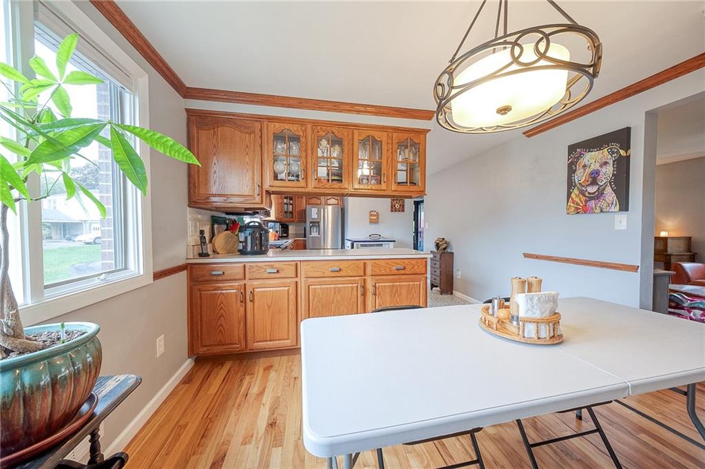 1004 Fiddleback Drive McKees Rocks, PA 15136 - Photo 7 of 41 a kitchen view with a table and chairs