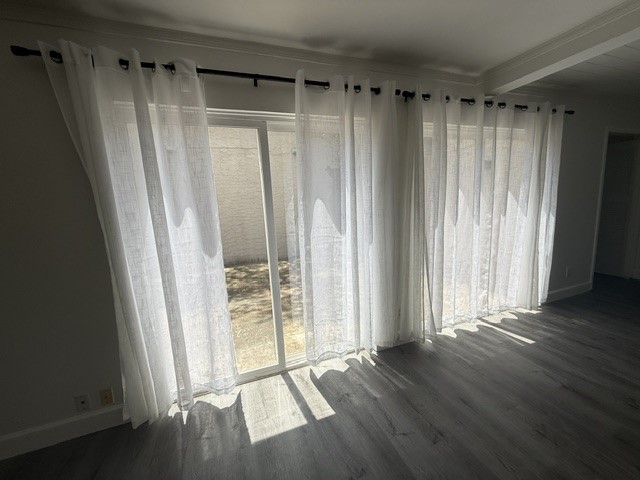 3304 Clawson Road, Unit B Austin, TX 78704 - Photo 5 of 12 Sun-filled interiors connect to outdoor space through elegant sliding doors.
