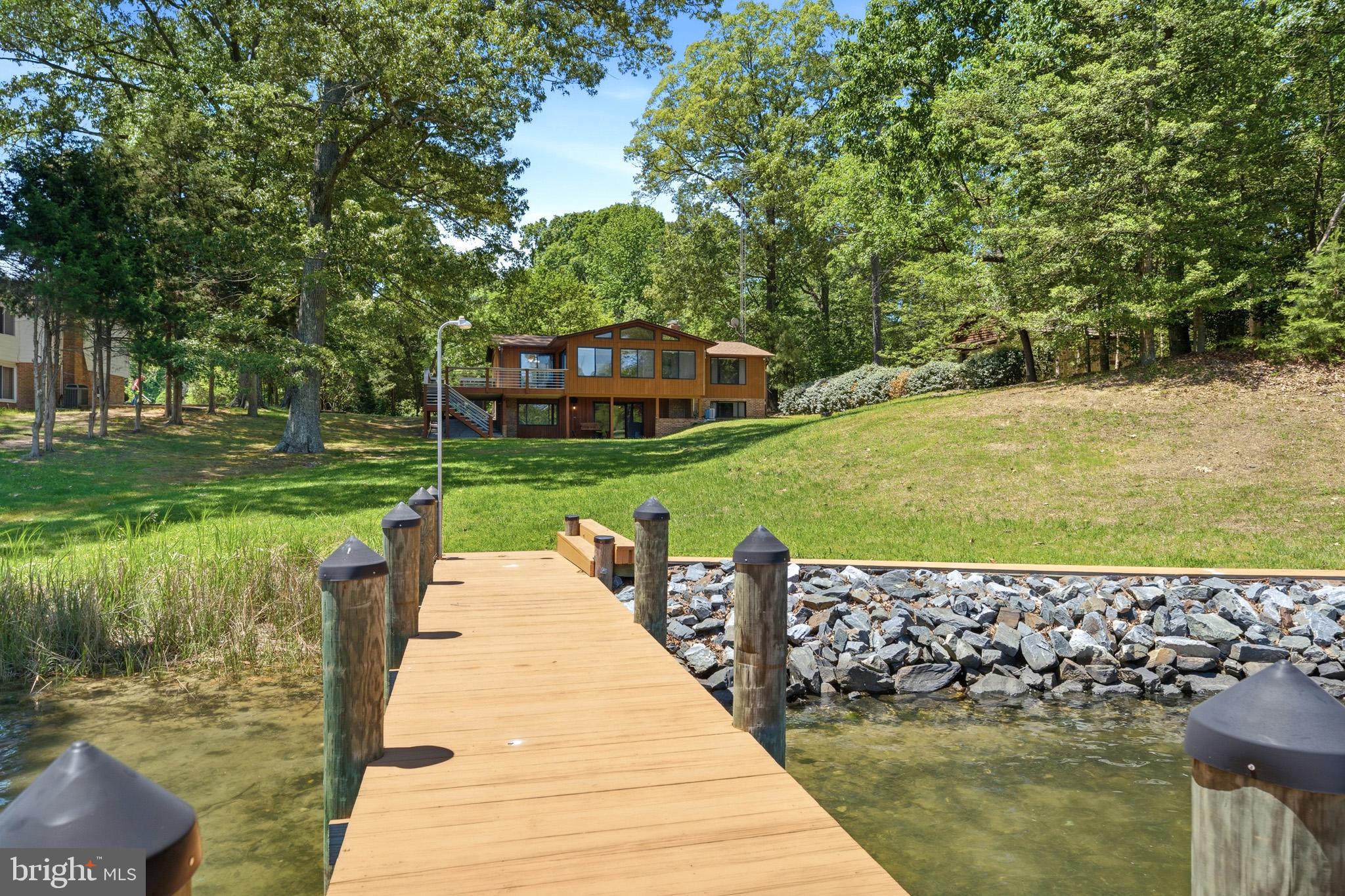 18040 Shipping Point Road Lexington Park, MD 20653 - Photo 56 of 75 View from the pier to the house.