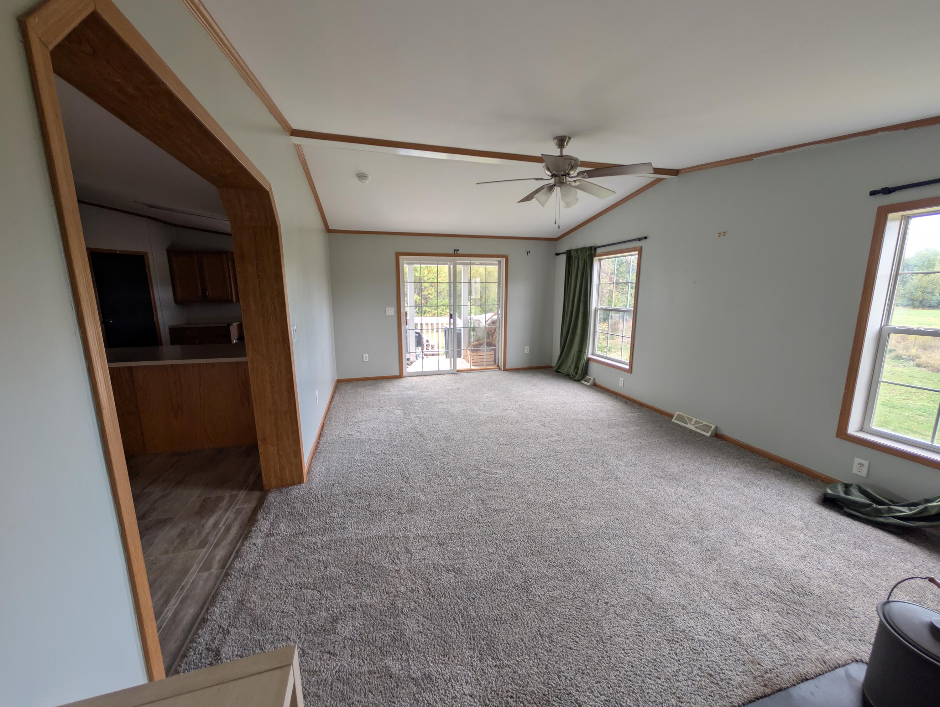 714 Cook Road Carmel, ME 04419 - Photo 17 of 34 Den and Woodstove 2