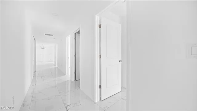 a kitchen with cabinets and white appliances