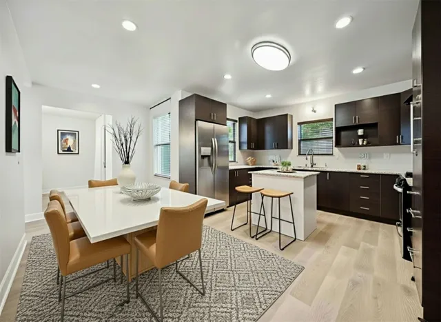 a bathroom with a bathtub and a sink