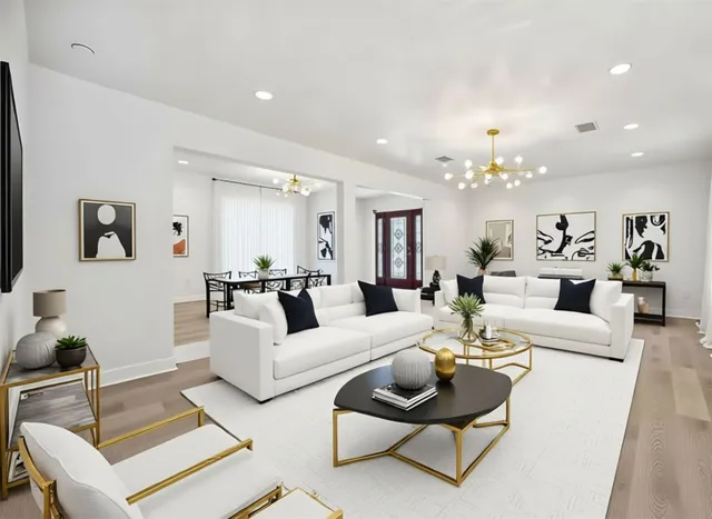 a large kitchen with stainless steel appliances kitchen island a sink a stove and cabinets