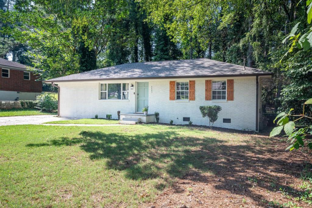 2643 Bull Run Drive Decatur, GA 30034 - Photo 1 of 1 a view of a house with yard and a garden