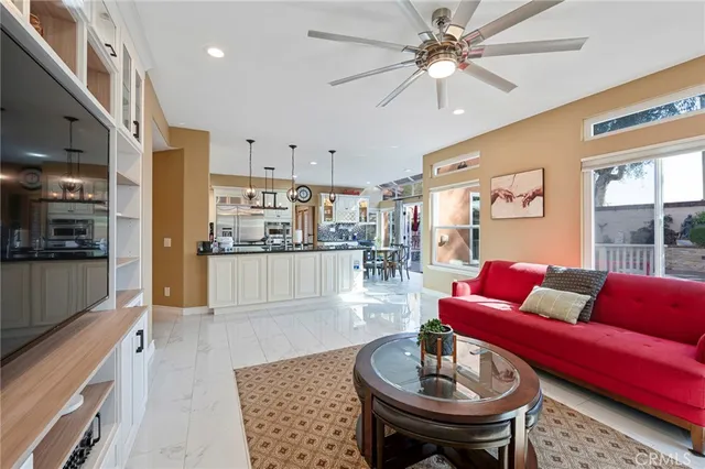 a bedroom with a bed and a television