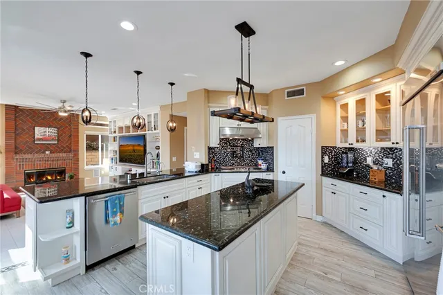 a kitchen with a stove and a microwave