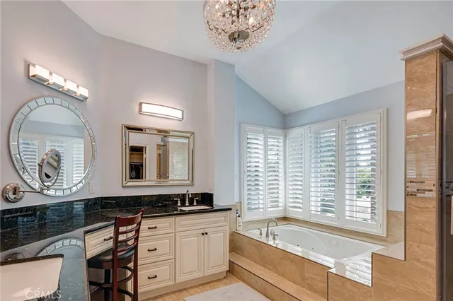 a view of a patio with swimming pool table and chairs
