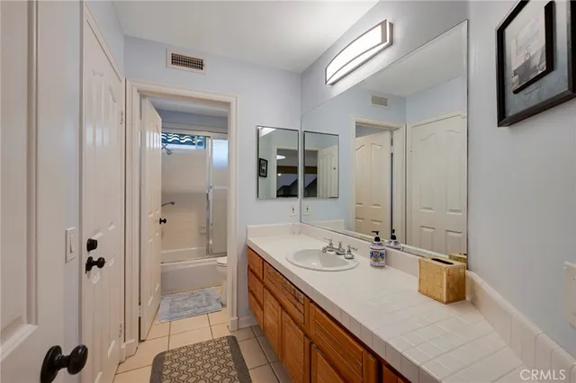 a view of a house with swimming pool patio