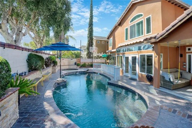a view of a house with a swimming pool