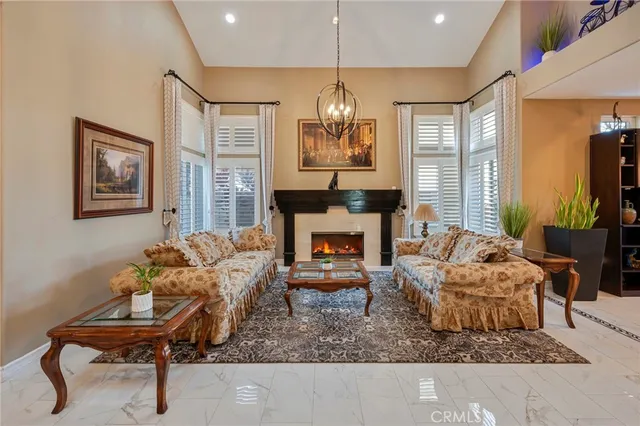 a living room with furniture rug and window