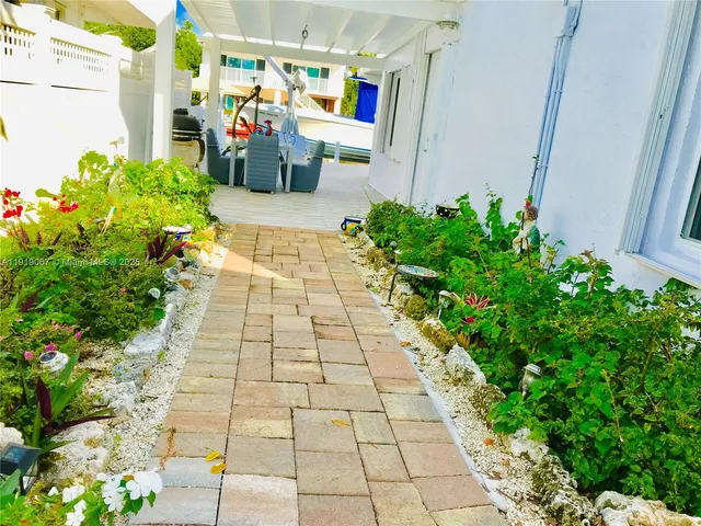 a view of path along with retail shop