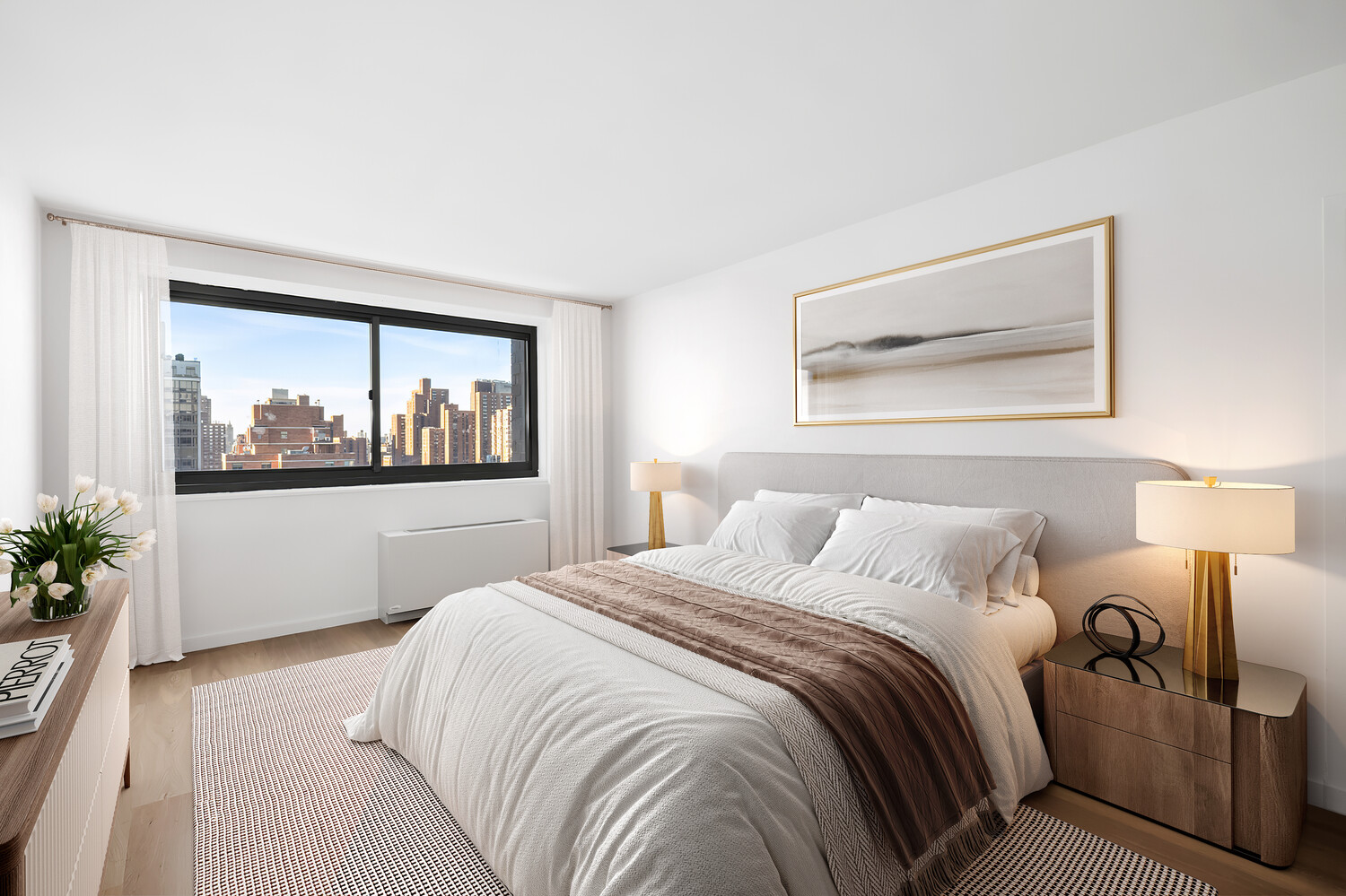 1725 York Avenue, Unit 31H Manhattan, NY 10128 - Photo 6 of 11 a bedroom with a bed and a painting on the wall