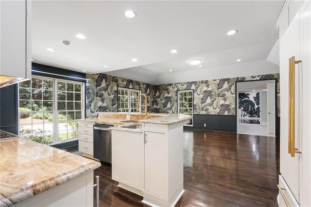 1190 West Wesley Road Northwest Atlanta, GA 30327 - Photo 12 of 46 a kitchen with a stove and a white refrigerator