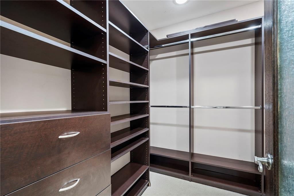 1190 West Wesley Road Northwest Atlanta, GA 30327 - Photo 26 of 46 a view of an empty walk in closet