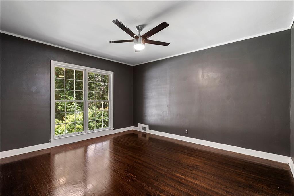 1190 West Wesley Road Northwest Atlanta, GA 30327 - Photo 29 of 46 a view of room with window and ceiling fan
