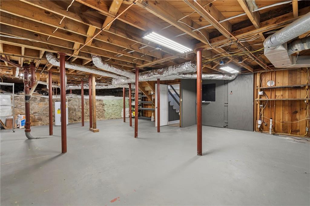 1190 West Wesley Road Northwest Atlanta, GA 30327 - Photo 36 of 46 a view of empty room with wooden ceiling