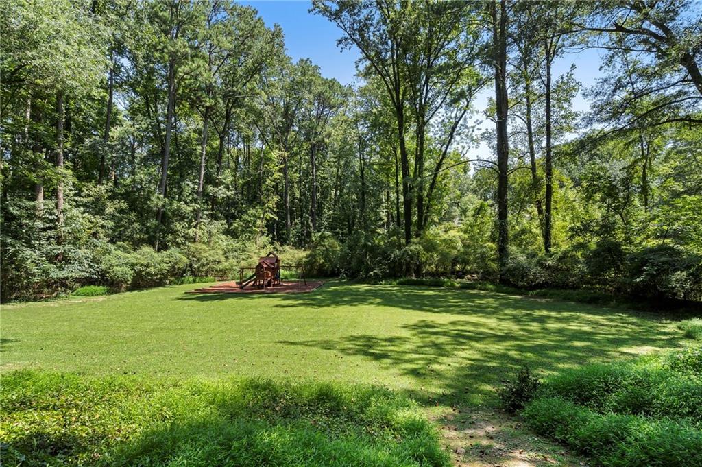 1190 West Wesley Road Northwest Atlanta, GA 30327 - Photo 43 of 46 a view of a trees in a yard