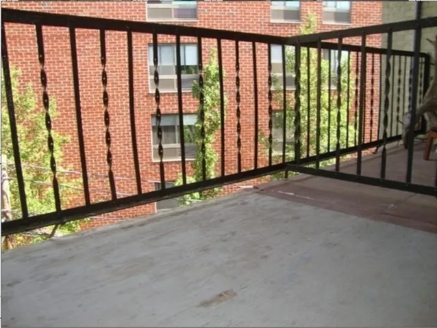 a view of staircase with window