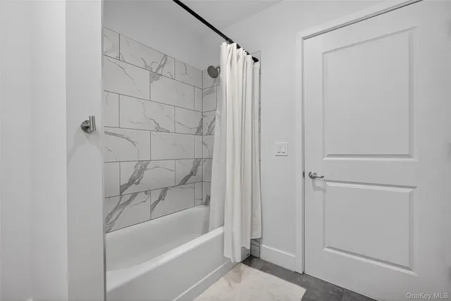 a bathroom with a bathtub