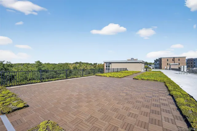 a view of a balcony with an outdoor space