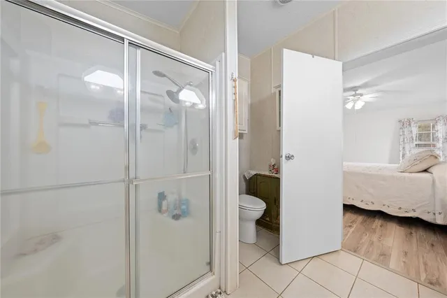 a bathroom with a tub and a shower