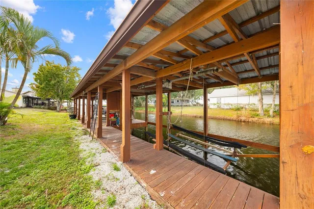 a view of a swimming pool with a patio