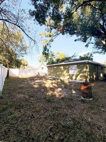 a view of a swimming pool with an outdoor space