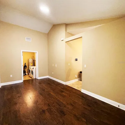a view of a storage & utility room with a sink