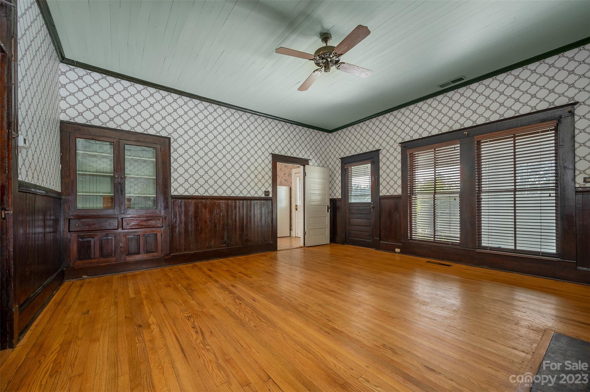 141 Wilson Road Rutherfordton, NC 28139 - Photo 9 of 48 a view of an empty room with wooden floor and a window