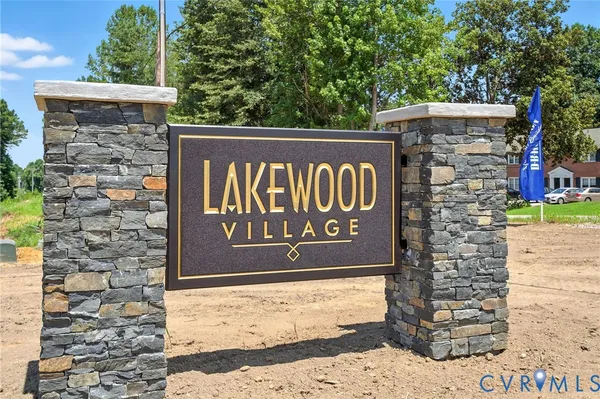 a sign broad on the brick wall