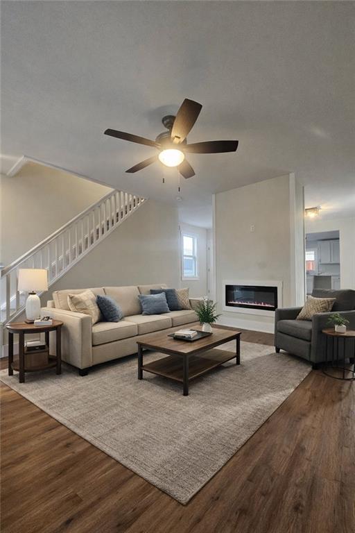 539 Walnut Street Vandergrift, PA 15690 - Photo 3 of 35 a living room with furniture and a chandelier