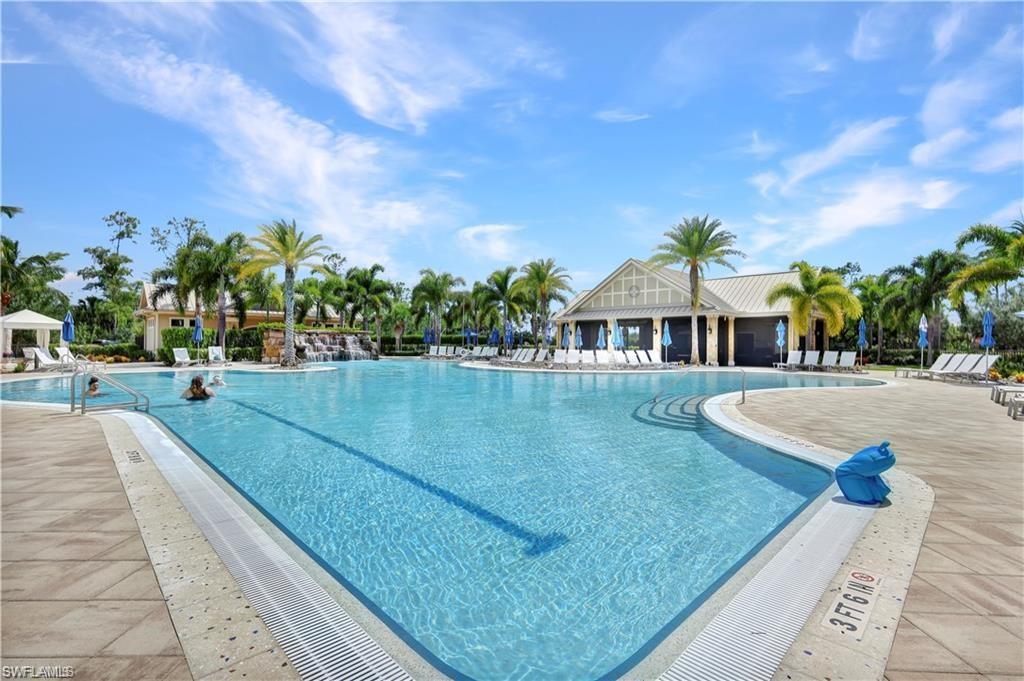 7103 Lily Way Naples, FL 34114 - Photo 29 of 41 a view of a house with swimming pool