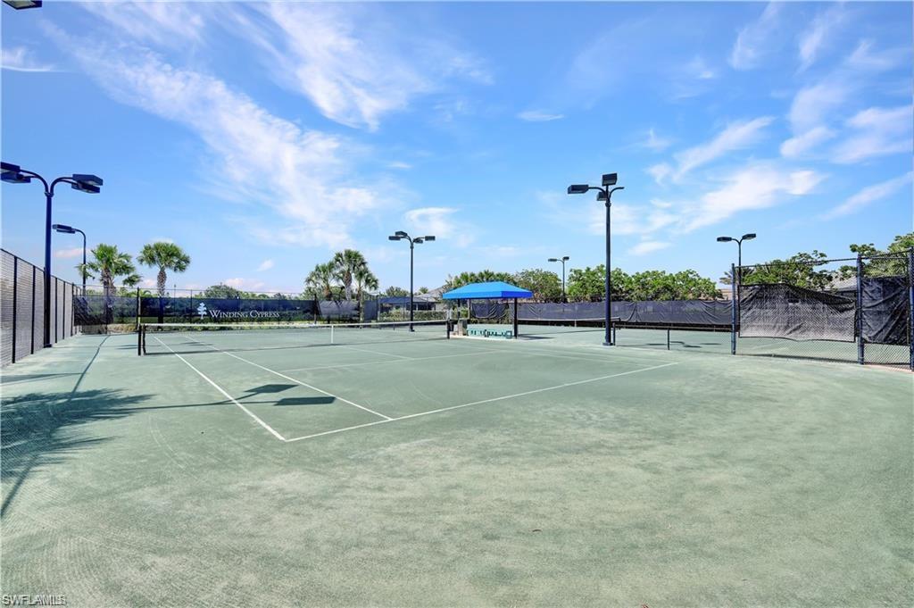 7103 Lily Way Naples, FL 34114 - Photo 38 of 41 a view of a tennis court