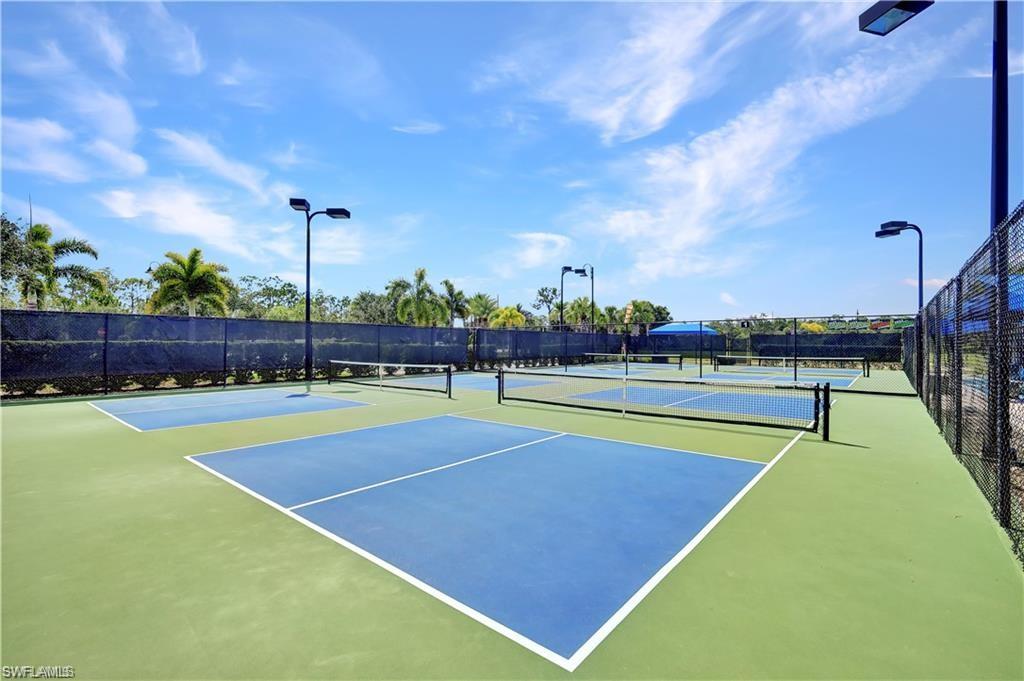 7103 Lily Way Naples, FL 34114 - Photo 39 of 41 a view of a tennis court