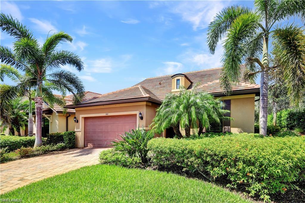 7103 Lily Way Naples, FL 34114 - Photo 41 of 41 a front view of a house with a yard