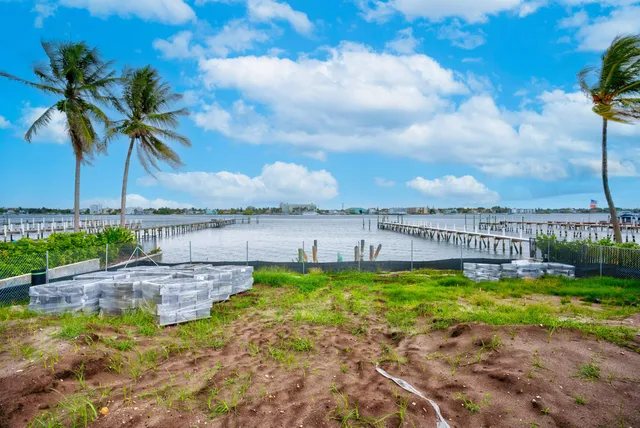 a view of a swimming pool and an outdoor seating