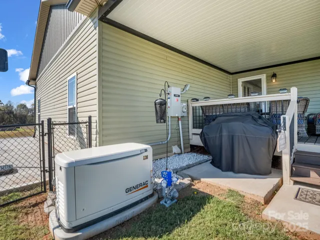 a utility room with sink dryer and washer