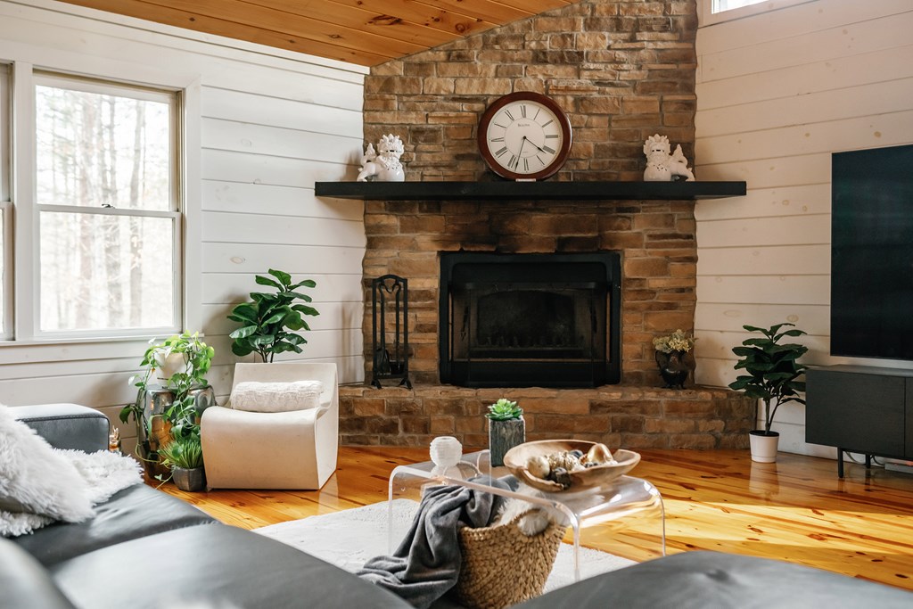 31 Highland Hammock Drive Blue Ridge, GA 30513 - Photo 28 of 67 a living room with furniture and a fireplace