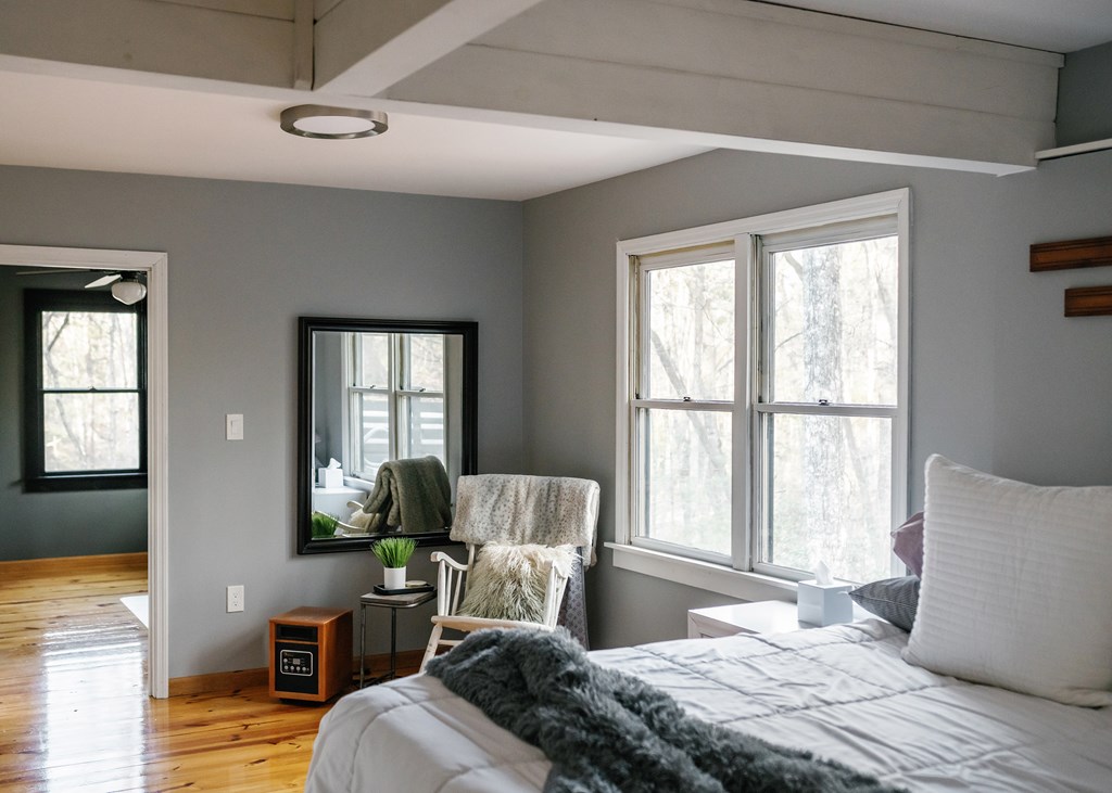 31 Highland Hammock Drive Blue Ridge, GA 30513 - Photo 38 of 67 a bedroom with a bed and wooden floor