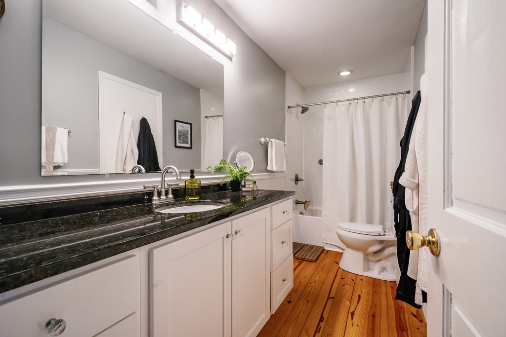 31 Highland Hammock Drive Blue Ridge, GA 30513 - Photo 40 of 67 a bathroom with a double vanity sink and a mirror