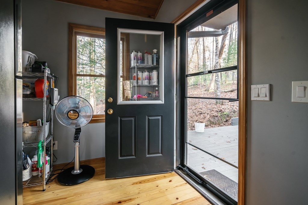 31 Highland Hammock Drive Blue Ridge, GA 30513 - Photo 43 of 67 a view of an entryway with wooden floor and windows
