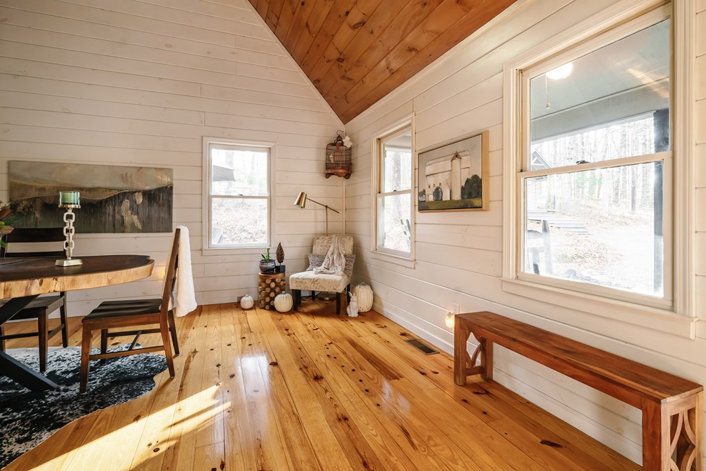 31 Highland Hammock Drive Blue Ridge, GA 30513 - Photo 8 of 67 a living room with furniture and a window