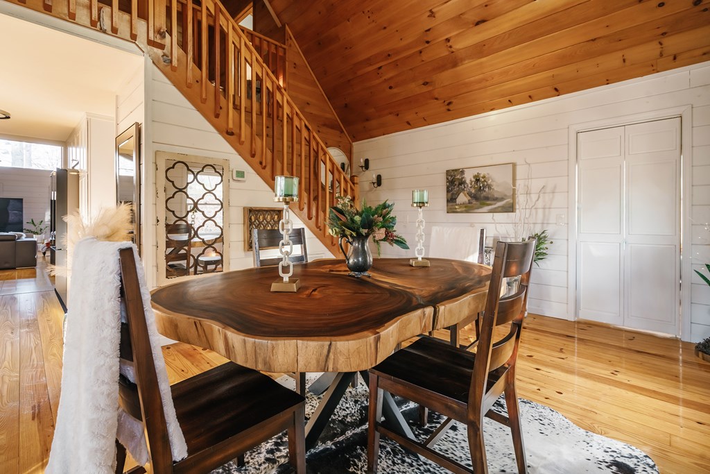 31 Highland Hammock Drive Blue Ridge, GA 30513 - Photo 10 of 67 a view of a dining room with furniture and wooden floor