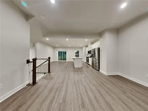 a view of a livingroom with wooden floor